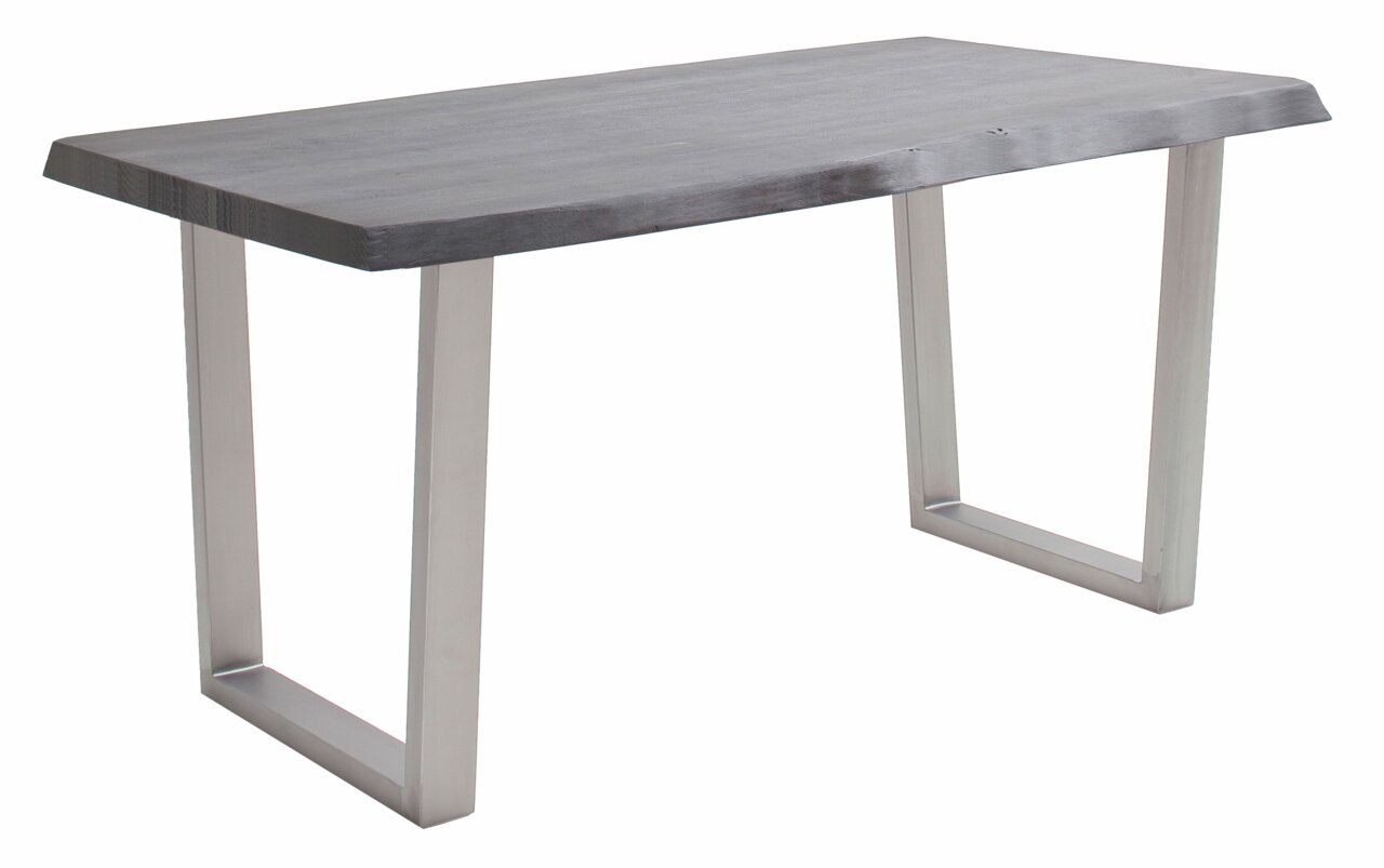 Moderne eettafel met V-vormige roestvrijstalen poten en een donkerhouten blad, zijaanzicht