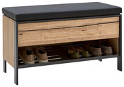 Garderobenbank mit schwarzer Sitzfläche und Holzfront, darunter ein Schuhregal mit Schuhen, seitliche Perspektive