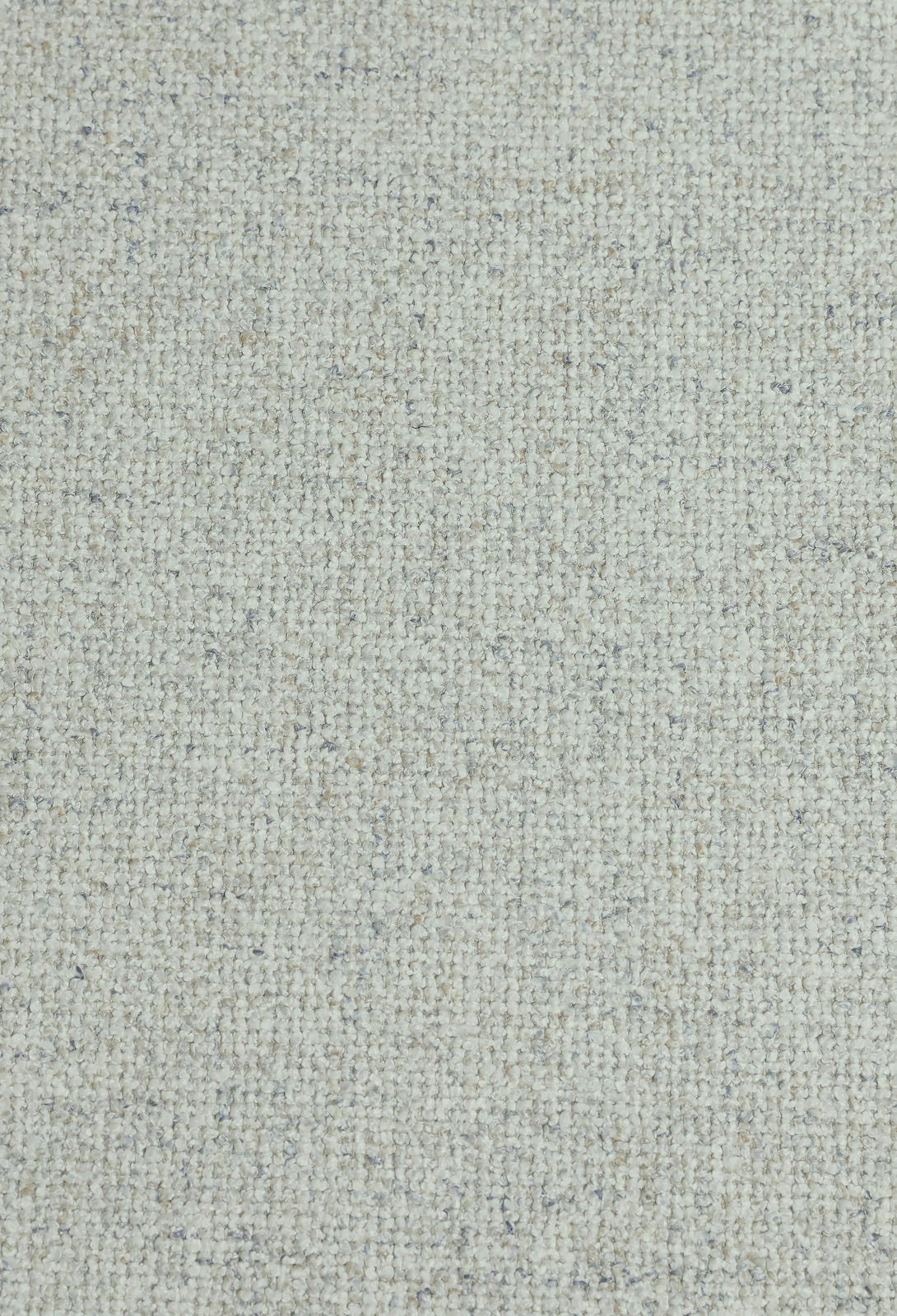 Nahaufnahme eines hellen, strukturierten Stoffes in beige mit feiner Webstruktur, Draufsicht.