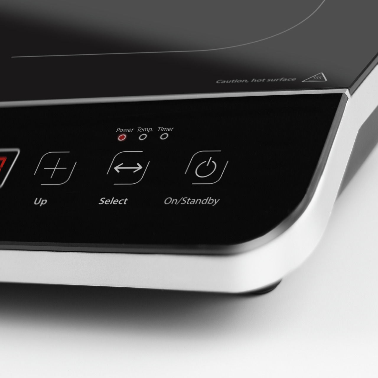 Nahaufnahme einer Einzelkochplatte mit Bedienfeld, das Tasten für Temperaturregelung und Standby-Modus zeigt.