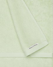 Hellgrünes Handtuch-Set aus weichem Material mit Marc O'Polo-Label, Draufsicht