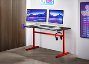 Moderne gamingtafel met twee beeldschermen, hoofdtelefoonhouder en bekerhouder, zijaanzicht.