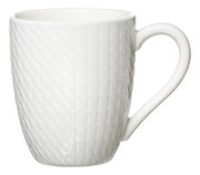 Weiße Tasse mit Rautenmuster, seitliche Perspektive