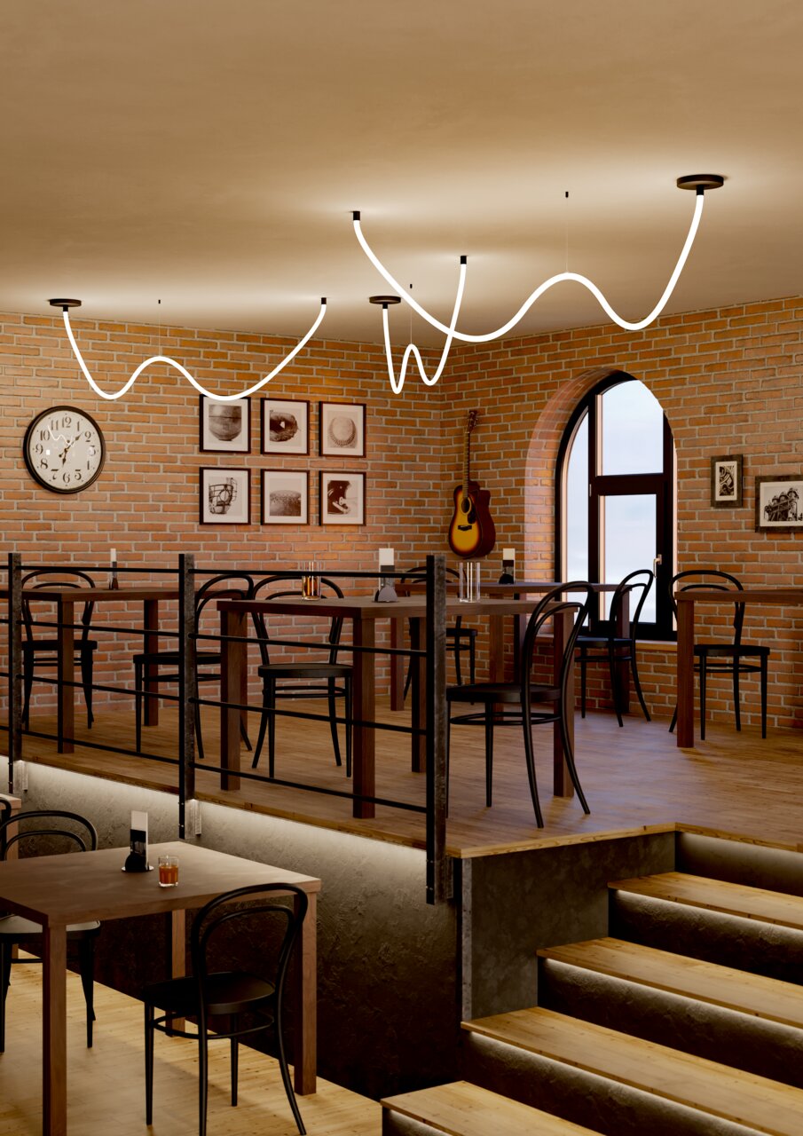 Een ledslinger in een gezellig café met bakstenen muren en houten meubels, gezien vanuit een laag standpunt.