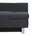 Detailansicht eines dunkelgrauen Funktionssofas mit weißem Bein, rechte Perspektive