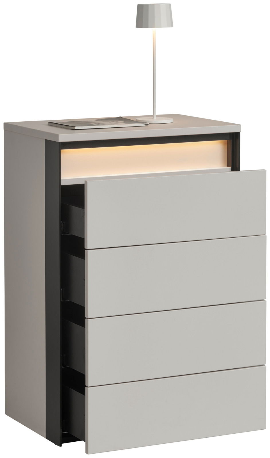 Hochkommode mit vier Schubladen, teilweise geöffnet, mit integrierter Beleuchtung und einer Tischlampe auf der Oberseite, seitliche Perspektive