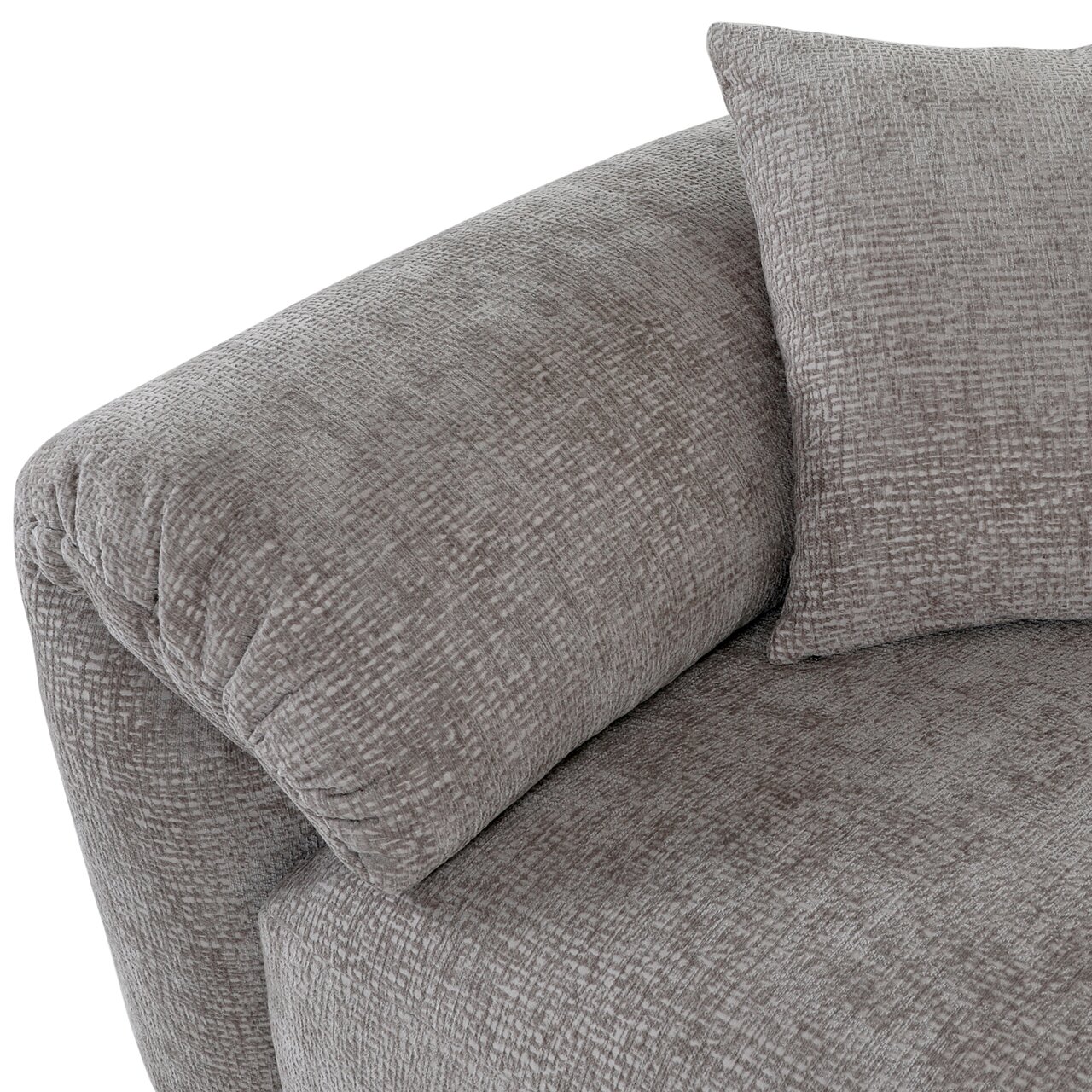 Nahaufnahme einer grauen Sofaecke mit Kissen, Perspektive von oben.