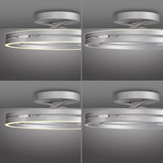 Moderne Deckenleuchte PURE Loop in silberner Ausführung, seitliche Perspektive, mit leuchtendem LED-Ring.