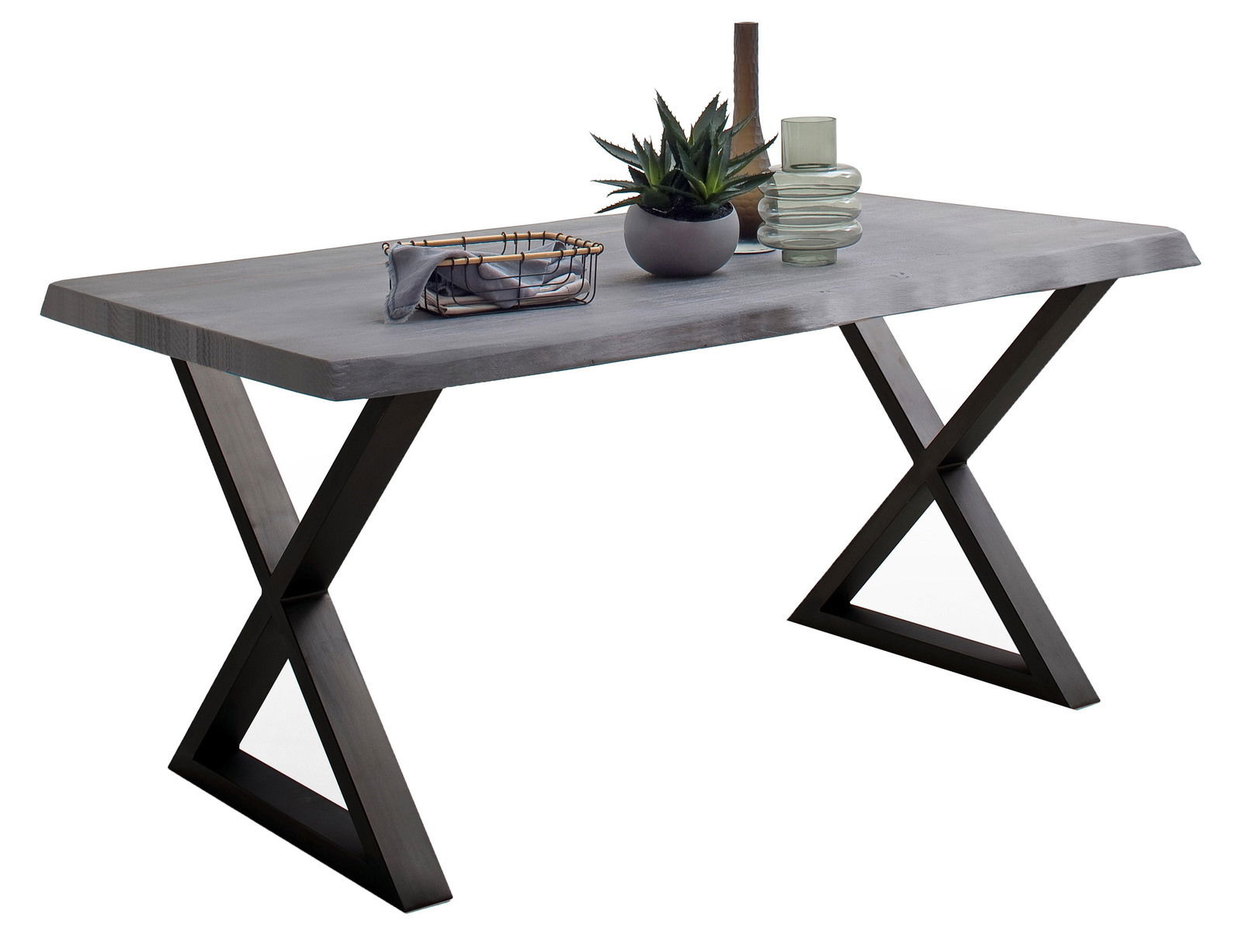 Moderner Esstisch mit X-förmigen Beinen aus dunklem Holz und einer glatten, grauen Tischplatte, seitliche Perspektive