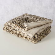 Gefaltete Decke mit Leopardenmuster, seitliche Perspektive