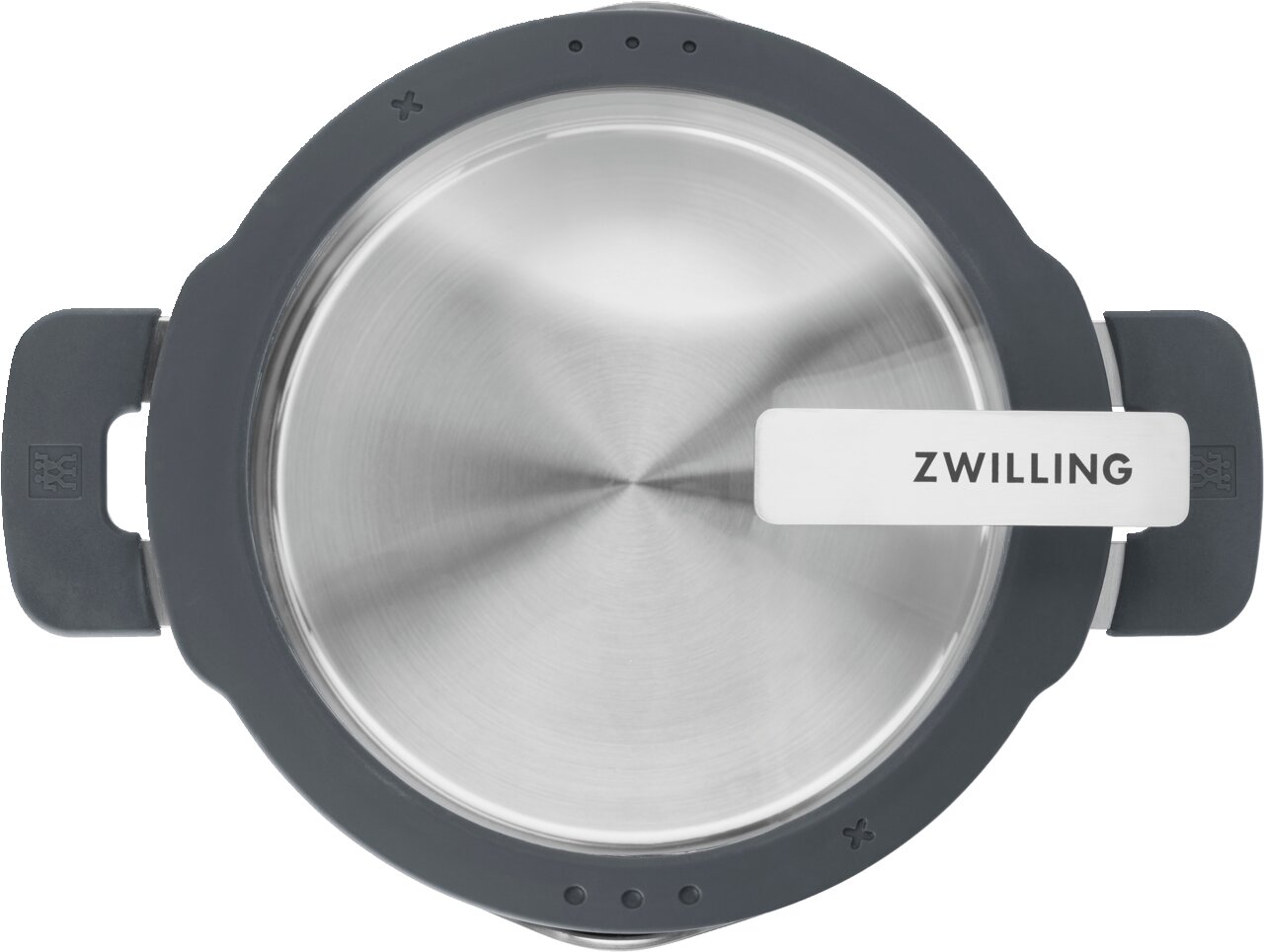 Bovenaanzicht van een roestvrijstalen pan met grijze rand en handgrepen, met het merk 'ZWILLING' op de handgreep van het deksel.