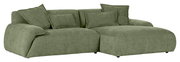 Grünes Ecksofa mit mehreren Kissen, Perspektive von vorne rechts