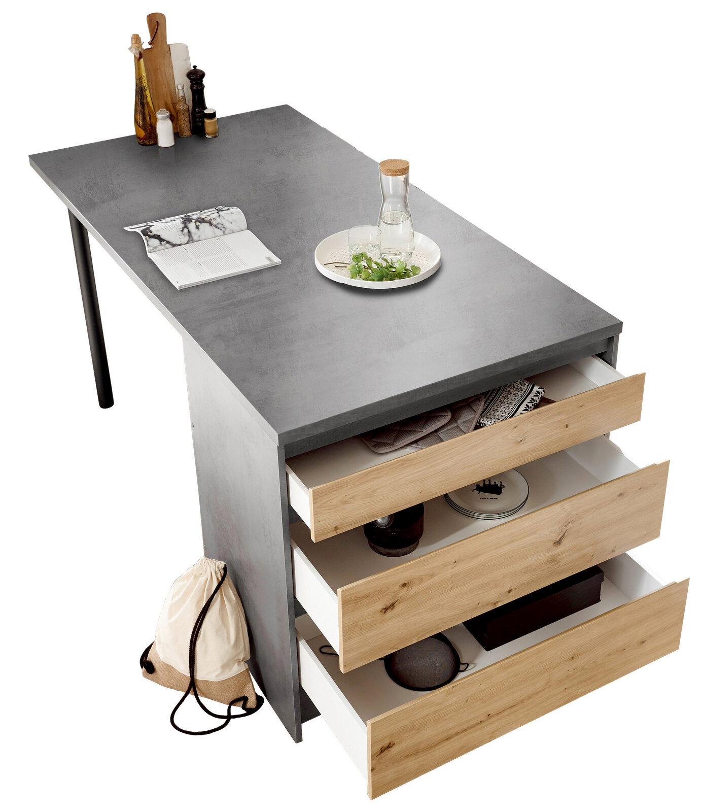 Kücheninsel mit grauer Arbeitsplatte, drei offenen Holzschubladen und Dekorationen aus der Vogelperspektive