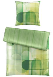 Grüne Wendebettwäsche mit geometrischem Muster, bestehend aus einem Kissenbezug und einem Bettdeckenbezug, aus der Vogelperspektive.