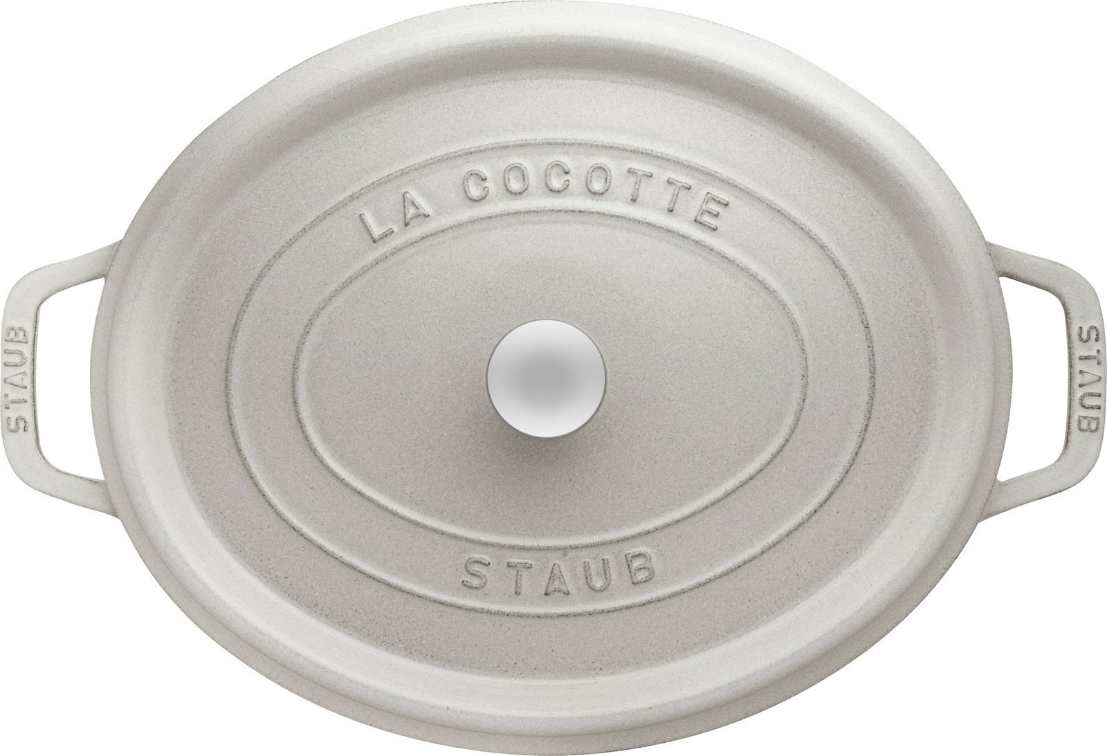 Obere Perspektive auf einen ovalen, weißen Bräter Cocotte 33cm mit der Aufschrift 'La Cocotte' und 'Staub'.