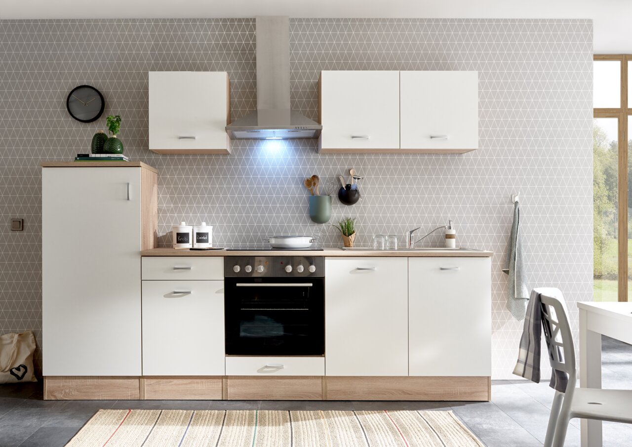 Yourkitchen Hängeschrank ANDY Moderne Küchenzeile mit weißen Schränken und Holzdetails, inklusive Herd und Dunstabzugshaube, aus frontaler Perspektive.