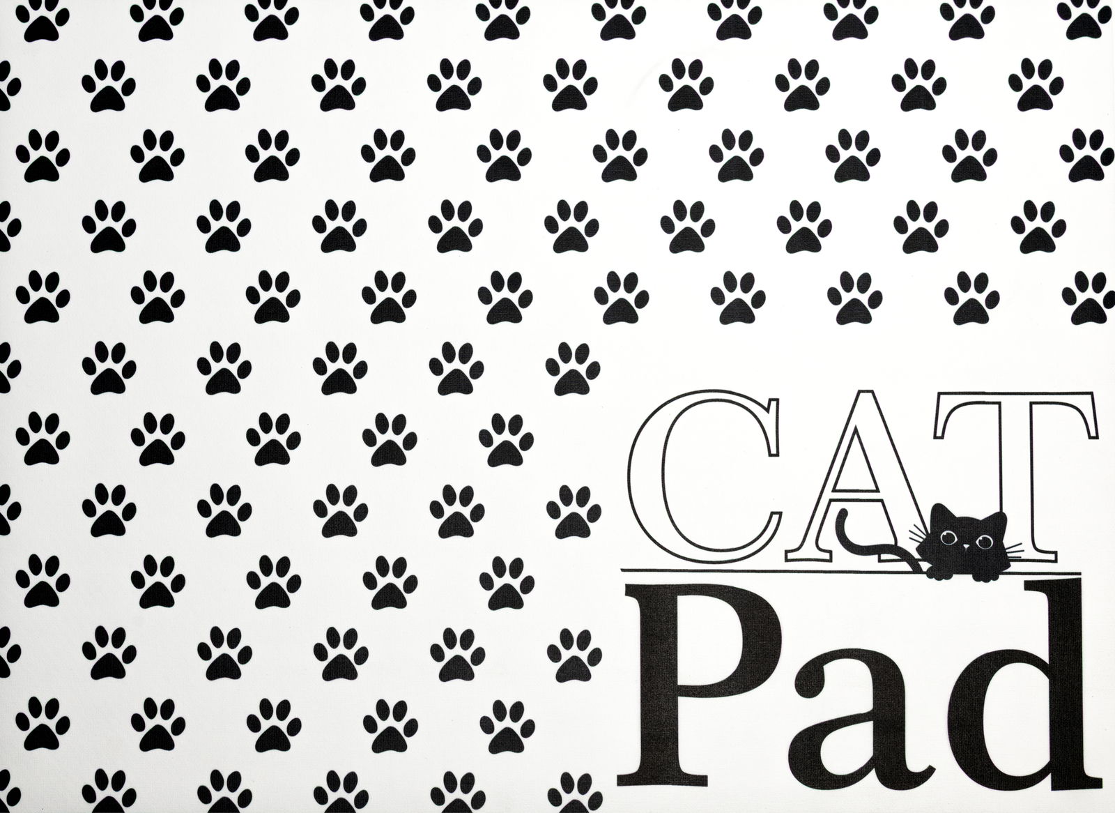 Stuco Fressnapfunterlage CAT PAD Fressnapfunterlage mit schwarzen Pfotenabdrücken und der Aufschrift 'CAT Pad' aus der Vogelperspektive