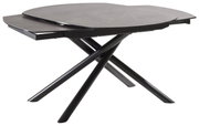 Moderne eettafel met een rond, donker tafelblad en schuin aflopende, zwarte poten, gezien vanaf de zijkant.