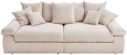 Beiges Big-Sofa mit mehreren Kissen, Vorderansicht
