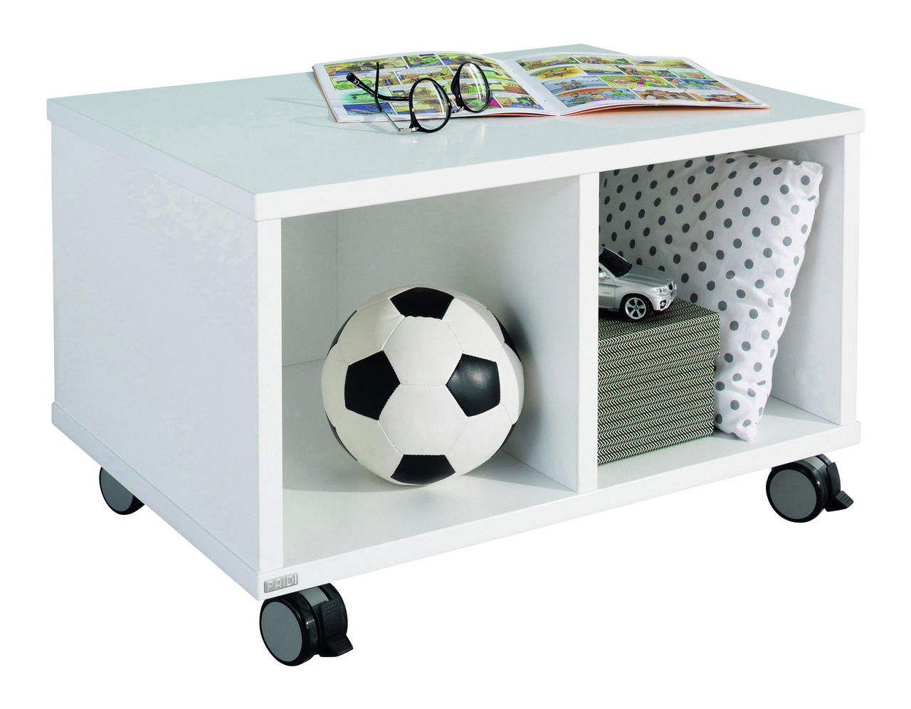 Weißes Rollregal mit zwei Fächern, gefüllt mit einem Fußball, einem Kissen und einem Spielzeugauto, seitliche Perspektive