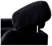 Nahaufnahme einer schwarzen Kopfstütze eines Sofas aus Leder, seitliche Perspektive.