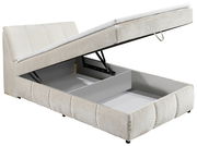 Boxspringbett mit geöffnetem Stauraum, seitliche Perspektive