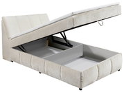 Boxspringbett mit geöffnetem Stauraum, seitliche Perspektive
