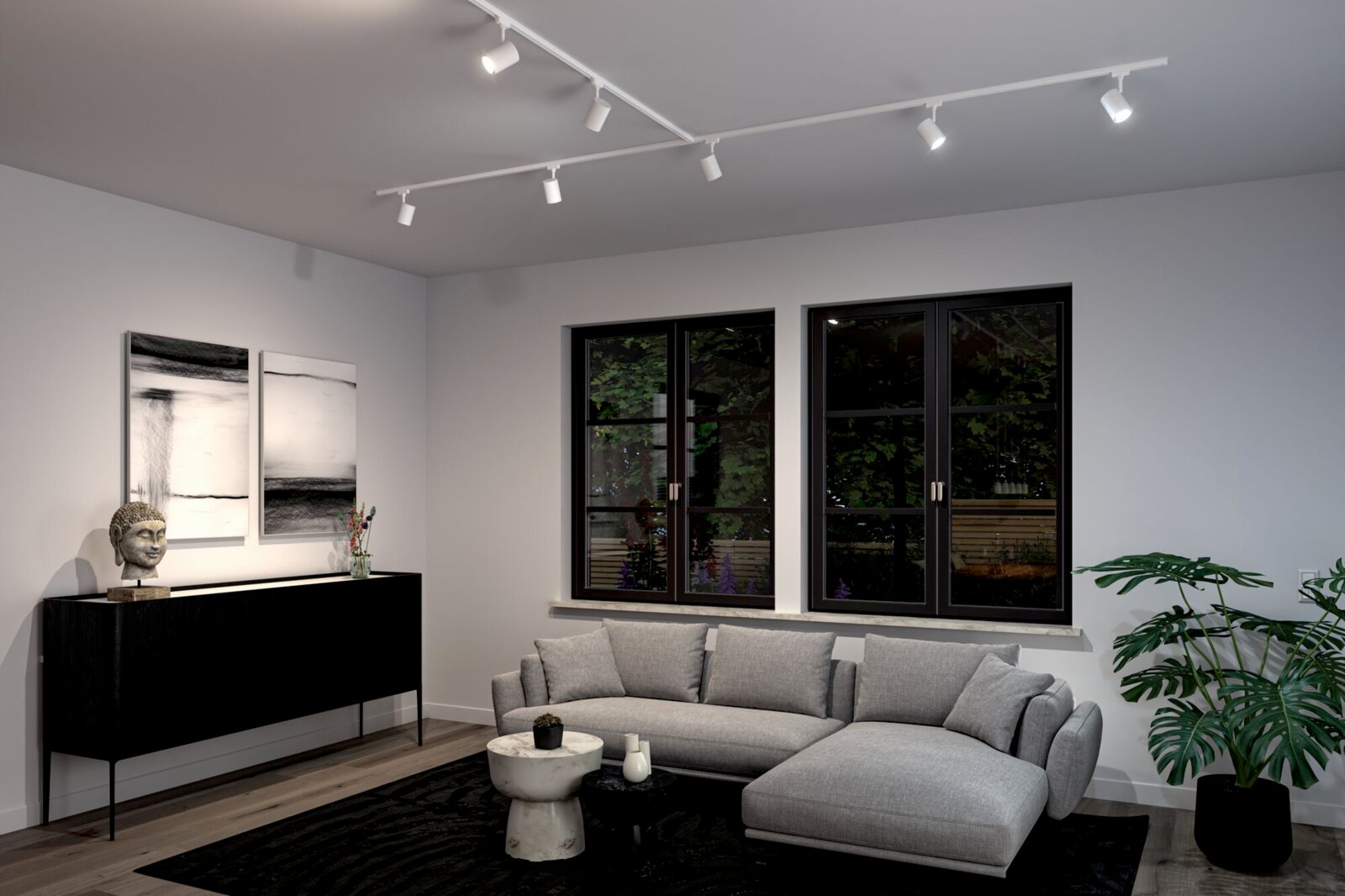 Moderne woonkamer met railspots aan het plafond, een grijze bank, een zwart tapijt en grote ramen. Aanzicht van voren.
