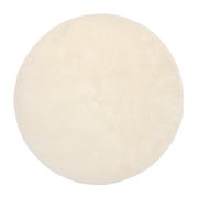 Runder, cremefarbener Teppich mit weicher Oberfläche, Draufsicht
