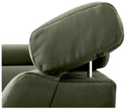 Nahaufnahme einer grünen Kopfstütze eines Sofas aus Stoff, seitliche Perspektive