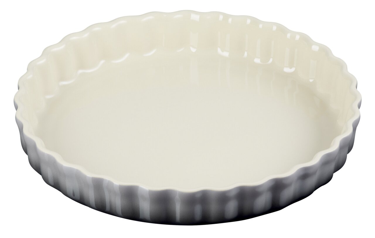 Runde Tarte-Form aus Keramik mit gewelltem Rand, Ansicht von oben.
