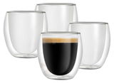 Vier doppelwandige Thermo-Espressogläser, eines mit Espresso gefüllt, aus frontaler Perspektive.
