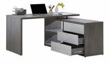Moderner Eck-Schreibtisch in grauer Holzoptik mit Laptop, Schreibutensilien und geöffneter Schublade, seitliche Perspektive