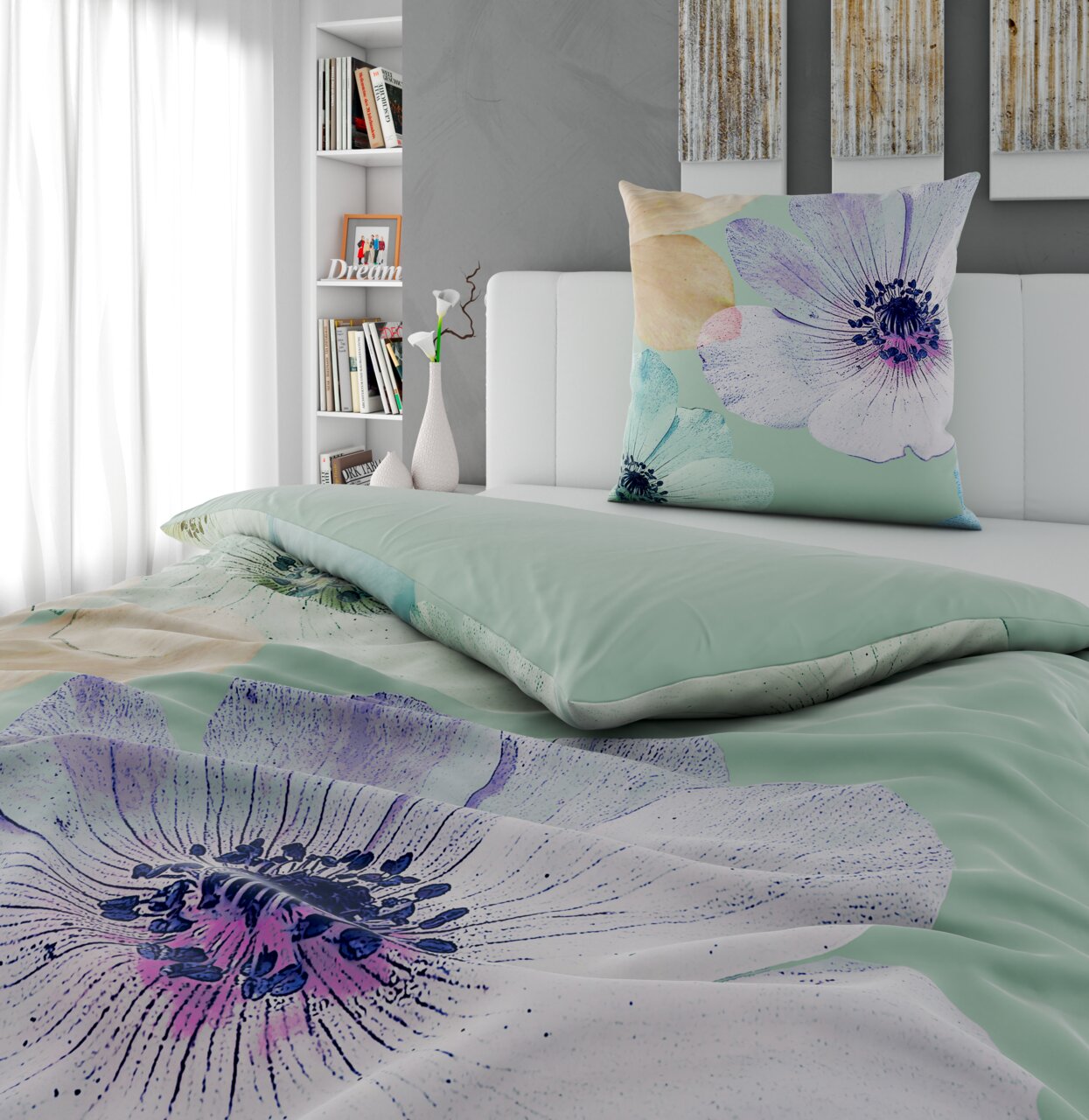 Bed met omkeerbaar beddengoed in pastelkleuren en met bloemmotief, gezien vanaf de zijkant