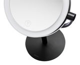 Standkosmetikspiegel mit Touch-Funktion, Ansicht von oben, schwarzer Standfuß und runder Spiegel mit beleuchtetem Rand.
