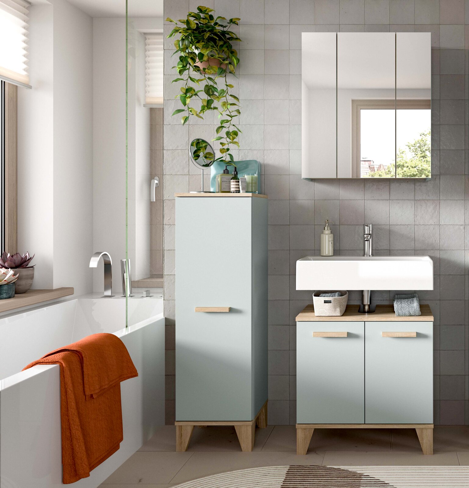 MID.YOU Badkombination STAR Modernes Badezimmer-Set mit mintgrünem Waschtischunterschrank und Hochschrank, Holzdetails und Spiegelschrank über dem Waschbecken, aufgenommen in frontaler Perspektive.