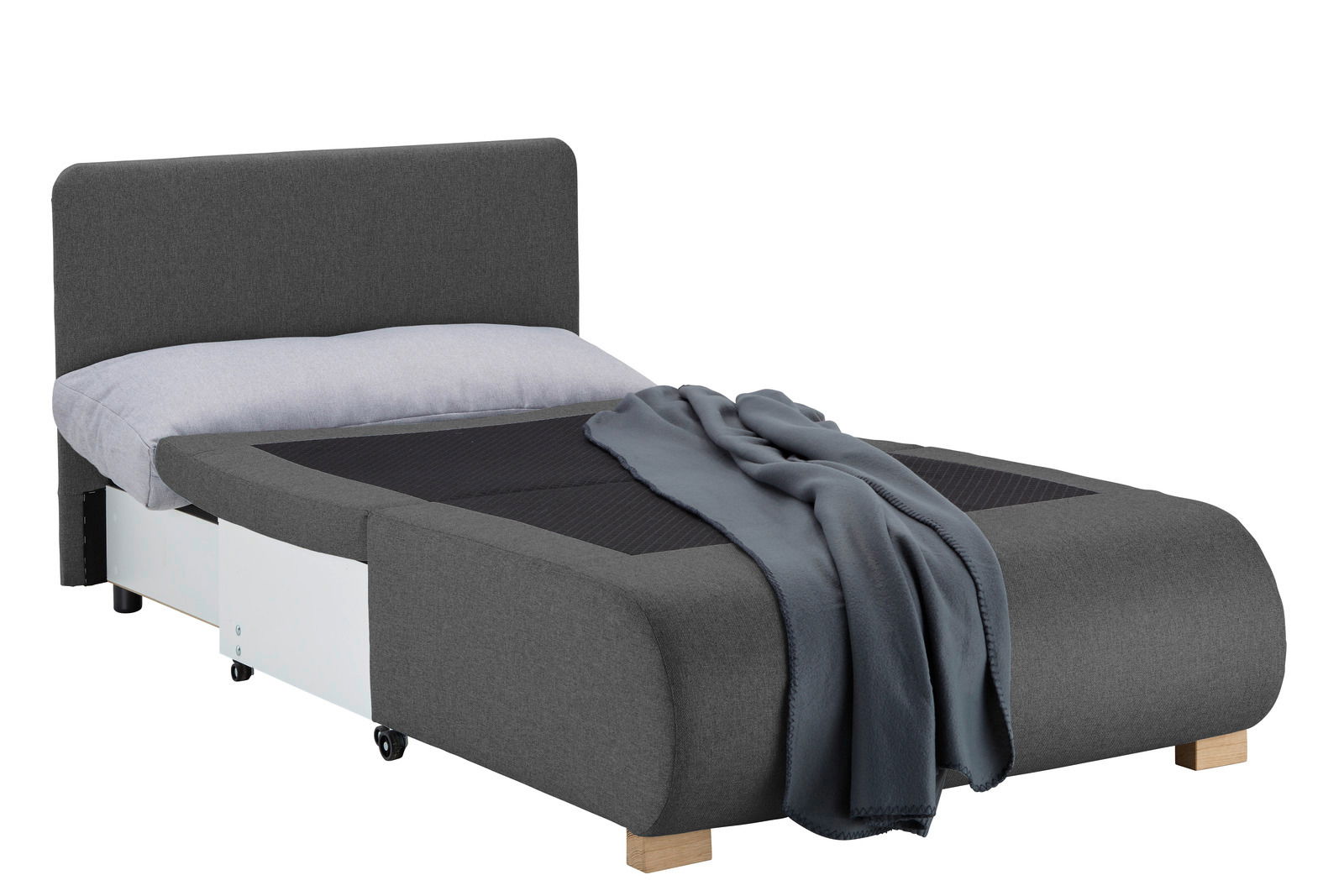 Grauer Funktionssessel in Bettposition mit Kopfkissen und Decke, seitliche Perspektive
