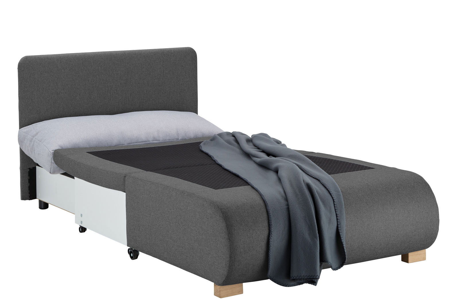 Grauer Funktionssessel in Bettposition mit Kopfkissen und Decke, seitliche Perspektive