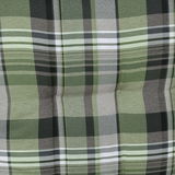 Nahaufnahme einer Sesselauflage mit grünem Karomuster