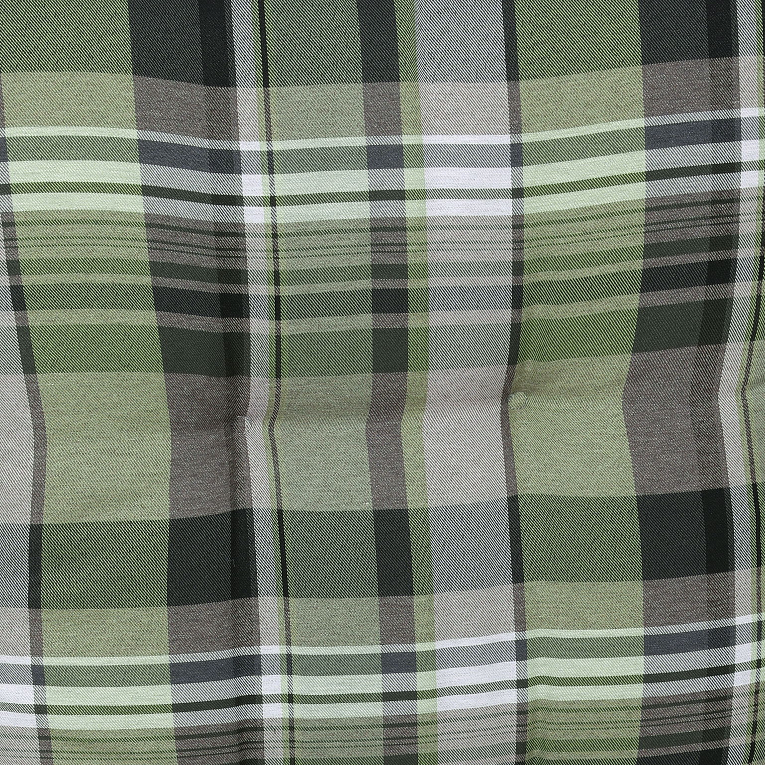 Nahaufnahme einer Sesselauflage mit grünem Karomuster