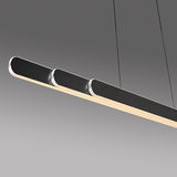 Moderne Pendelleuchte ADRIANA ROUND von Paul Neuhaus in seitlicher Perspektive, mit elegantem, schlankem Design und schwarzem Finish.