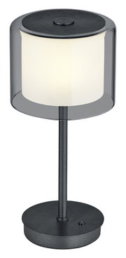 Moderne LED-Tischleuchte KLARA mit zylindrischem, transparentem Schirm und schwarzem Sockel, seitliche Perspektive