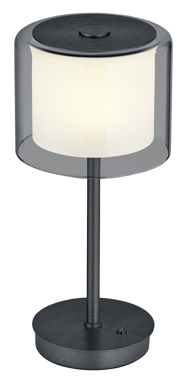 Moderne LED-Tischleuchte KLARA mit zylindrischem, transparentem Schirm und schwarzem Sockel, seitliche Perspektive