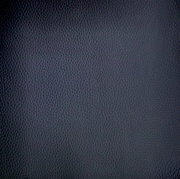 Nahaufnahme der dunkelgrauen, strukturierten Oberfläche des Armlehnstuhls Dieter Knoll Armlehnstuhl PABLO