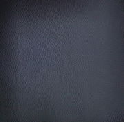 Nahaufnahme der dunkelgrauen, strukturierten Oberfläche des Armlehnstuhls Dieter Knoll Armlehnstuhl PABLO