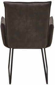 Rückansicht eines Sessels mit dunklem Stoffbezug und schwarzen Metallbeinen.