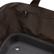 Innenansicht eines braunen Einkaufskorbs mit Reißverschlussfach und Tragegriff.