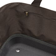 Innenansicht eines braunen Einkaufskorbs mit Reißverschlussfach und Tragegriff.