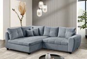 Graue Rundecke (L) in einem modernen Wohnzimmer, seitliche Perspektive