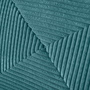 Nahaufnahme eines strukturierten, gerippten Stoffes in Türkis, perspektivisch von oben betrachtet.